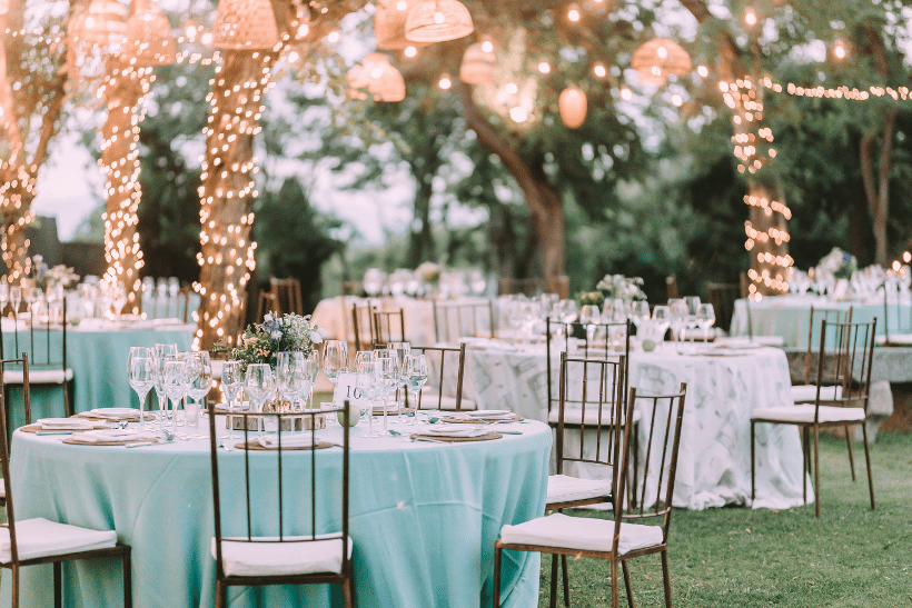 outdoor lighting and seating at a wedding